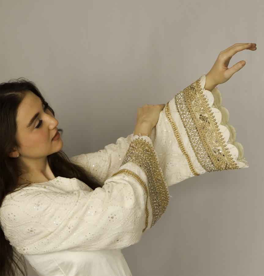 THE WORLD OF ZINAT ALI